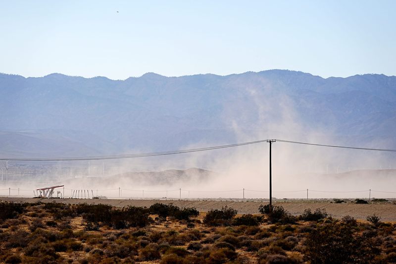 Windblown dust is visible through the Whitewater wash in Palm Springs, Calif., on Sunday, May 3, 2026.