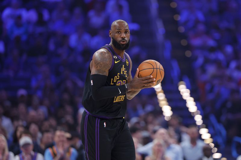Apr 2, 2026; Oklahoma City, Oklahoma, USA; Los Angeles Lakers forward LeBron James (23) moves the ball down the court against the Oklahoma City Thunder during the first quarter at Paycom Center. Mandatory Credit: Alonzo Adams-Imagn Images