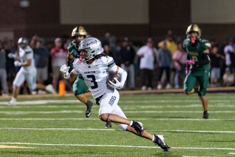 Hamilton Huskies Roye Oliver III (3) runs with the ball against the Basha Bears during a game at Basha High School in Chandler on Oct. 24, 2025.