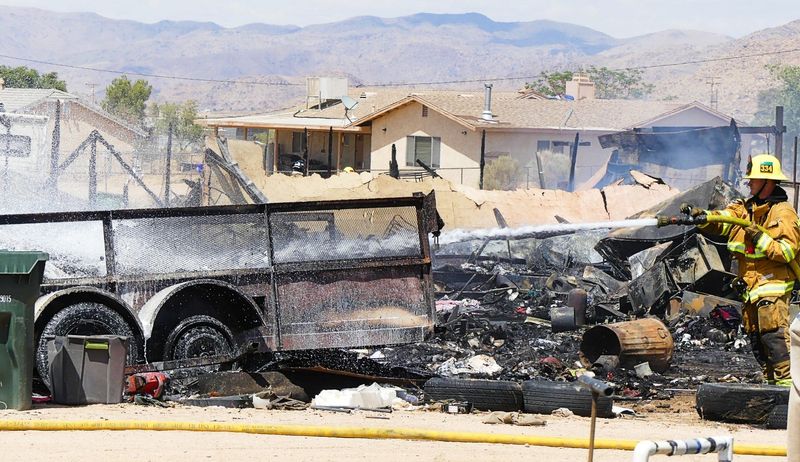A fire scorched a mobile home, several vehicles and other items on residential property near Blackfoot Road and Columbia Road in unincorporated Apple Valley on Tuesday, May 5, 2026.