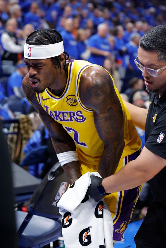 May 5, 2026; Oklahoma City, Oklahoma, USA; Los Angeles Lakers forward Jarred Vanderbilt (2) walks off the court and to the locker room in pain after a play against the Oklahoma City Thunder in the first half during game one of the second round of the 2026 NBA Playoffs at Paycom Center. Mandatory Credit: Alonzo Adams-Imagn Images