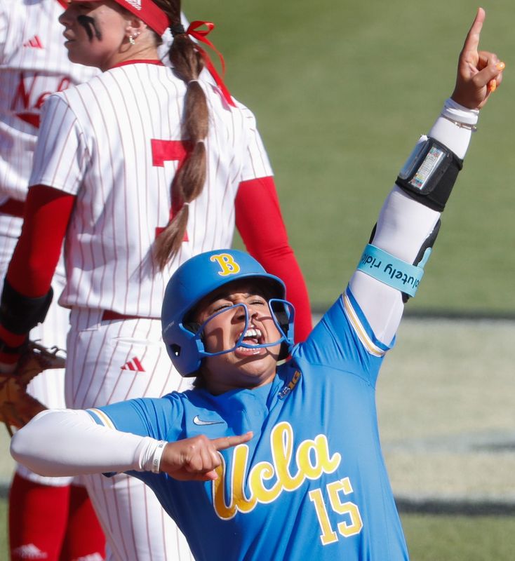 UCLA Bruins infielder Jordan Woolery (15) celebrates after getting on base Friday, May 9, 2025, during the Big Ten softball tournament game against the Nebraska Cornhuskers at Purdue Universityâ€™s Bittinger Stadium in West Lafayette, Indiana.