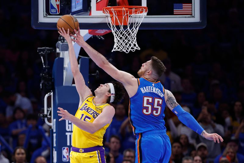 May 5, 2026; Oklahoma City, Oklahoma, USA; Oklahoma City Thunder center Isaiah Hartenstein (55) blocks a shot by Los Angeles Lakers guard Austin Reaves (15) in the second half during game one of the second round of the 2026 NBA Playoffs at Paycom Center. Mandatory Credit: Alonzo Adams-Imagn Images