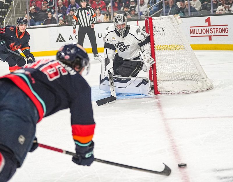 Coachella Valley Firebirds forward Logan Morrison dives in desperation as he fires off a shot toward Ontario Reign goalie Erik Portillo during the first period of Game 3 of the second round of the Calder Cup playoffs at Acrisure Arena in Palm Desert, Calif., Tuesday, May 5, 2026.