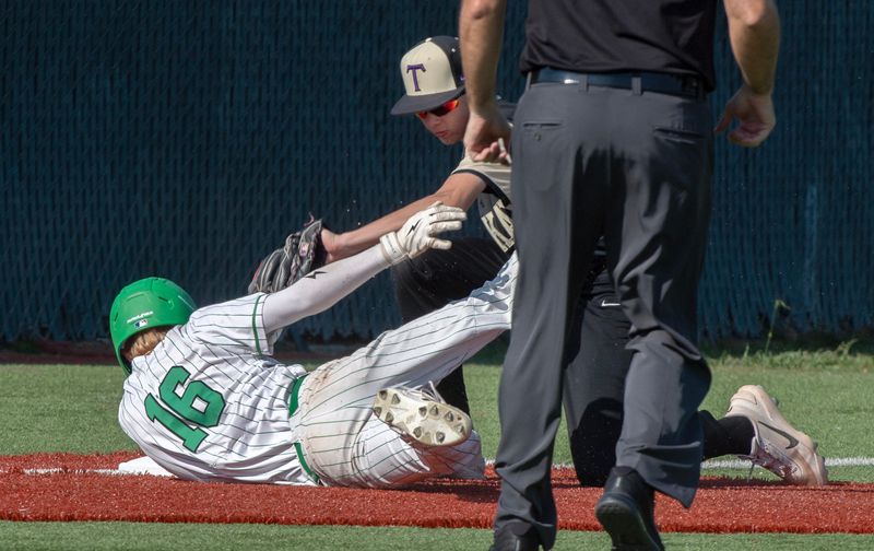 Tokay’s Gavin Severson, top, tags out St. Mary’s Gino Lovotti at third during a first round game of the Sac-Joaquin Section baseball playoffs at St. Mary’s high School in Stockton on May 6, 2026.St. Mary’s won 11-0.