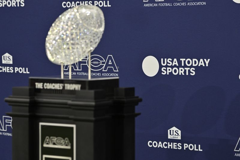Oct 4, 2025; Dallas, Texas, USA; A view of the US LBM Coaches Poll-AFCA Coaches Trophy before the game between the SMU Mustangs and the Syracuse Orange at Gerald J. Ford Stadium. Mandatory Credit: Jerome Miron-Imagn Images