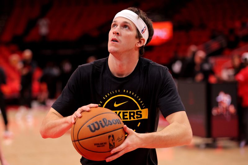 May 1, 2026; Houston, Texas, USA; Los Angeles Lakers guard Austin Reaves (15) warms up prior to game six of the first round of the 2026 NBA Playoffs against the Houston Rockets at Toyota Center. Mandatory Credit: Erik Williams-Imagn Images