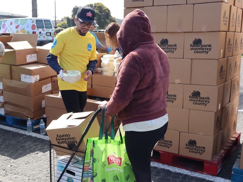 Hundreds gather at Vineyard Church on May 7, 2026, for a food distribution featuring boxes of fresh produce donated by Fresh Express and Chiquita, in partnership with Planet Harvest, as part of the Fresh Communities Tour: From the Fields to America’s Cities, in Salinas, Calif.