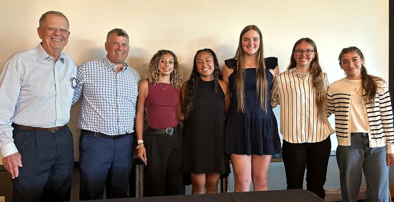 Rotary Club of Redding members Ken Seamans and Brian Seamans, representing the Seamans Family Foundation, pose with the girls 2026 Scholar-Athletes, from left, runner-up Brooklyn Bivins of Weed, winner Mahayla Guevarra of West Valley, runner-up Renna Shriner of Anderson, runner-up Samantha Johnson and runner-up Tea Kaizen of Central Valley. Not pictured is runner-up Audrey Berg of U-Prep.
