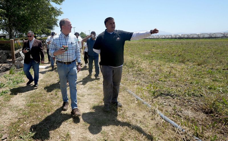 U.S. Sen. Adam Schiff, D-California, tours Carranza Family Farm with Tony Carranza, whose father co-owns the farm, in Camarillo on May 7.