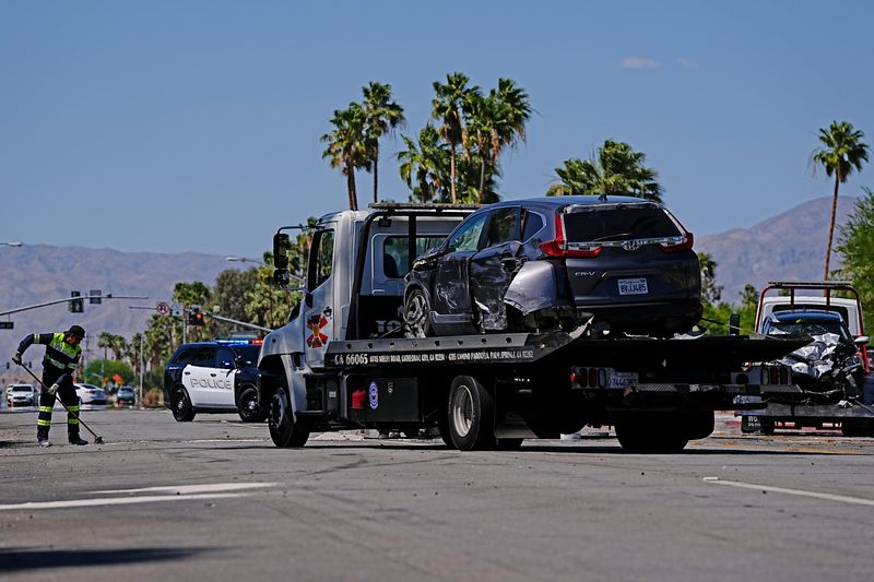 Vehicles are towed after a crash on Sunrise Way in Palm Springs on Thursday, May 7, 2026.