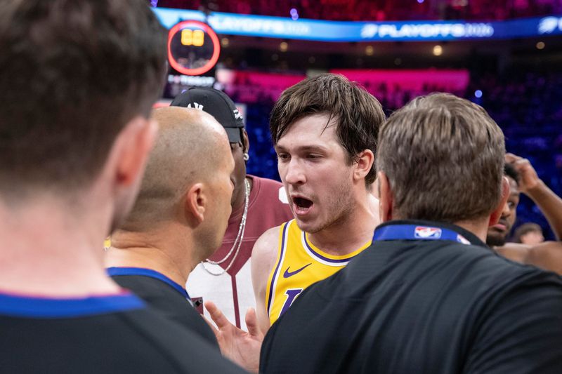 May 7, 2026; Oklahoma City, Oklahoma, USA; Los Angeles Lakers guard Austin Reaves (15) talks to an referee John Goble mid court after the end of game two of the second round of the 2026 NBA Playoffs against the Oklahoma City Thunder at Paycom Center. Mandatory Credit: Alonzo Adams-Imagn Images