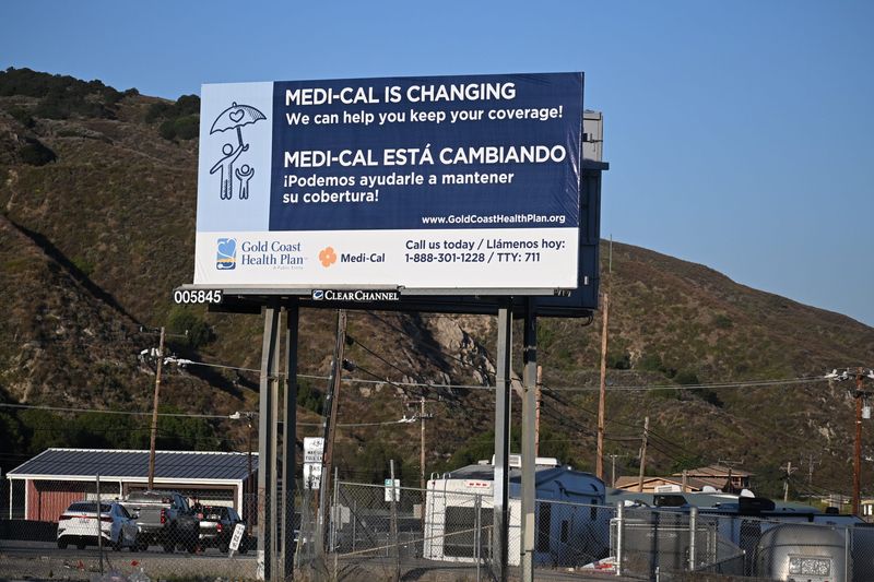 A billboard along Highway 126 in Fillmore on May 7 urges people to keep their Medi-Cal insurance coverage. Enrollment in the program is falling.