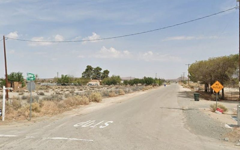 Chamisal Street, facing north toward Smith Road from El Mirage Road, in El Mirage.