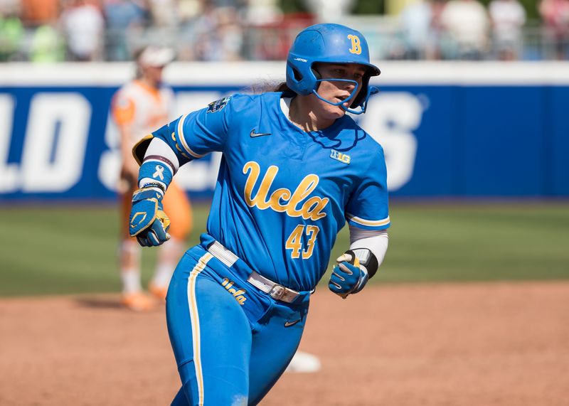 Jun 1, 2025; Oklahoma City, OK, USA; UCLA Bruins utility Megan Grant (43) rounds the bases after hitting a two run home run tying the game in the seventh inning against the Tennessee Lady Volunteers during the NCAA Softball Women's College World Series at Devon Park. Mandatory Credit: Brett Rojo-Imagn Images