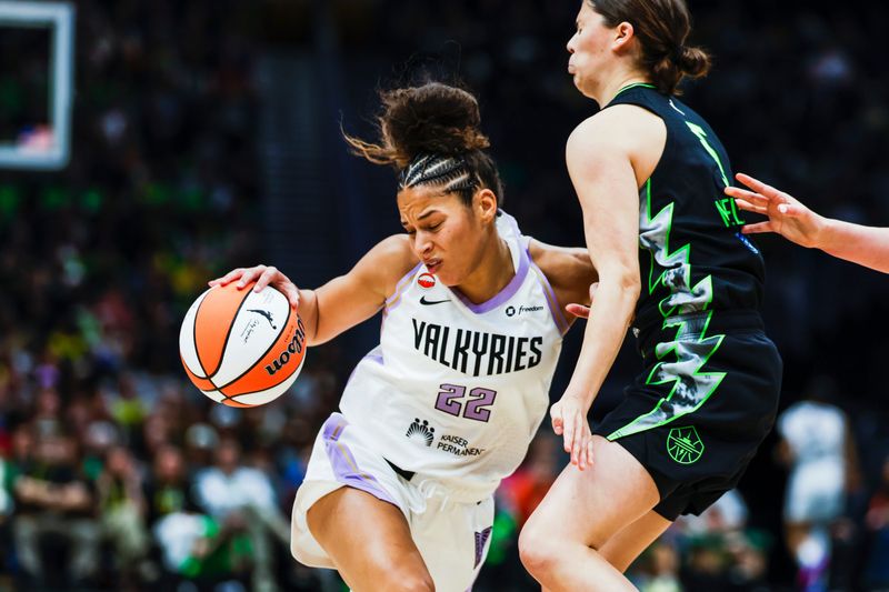 May 8, 2026; Seattle, Washington, USA; Golden State Valkyries guard Veronica Burton (22) dribbles against Seattle Storm guard Jade Melbourne (5) during the first quarter at Climate Pledge Arena. Mandatory Credit: Joe Nicholson-Imagn Images