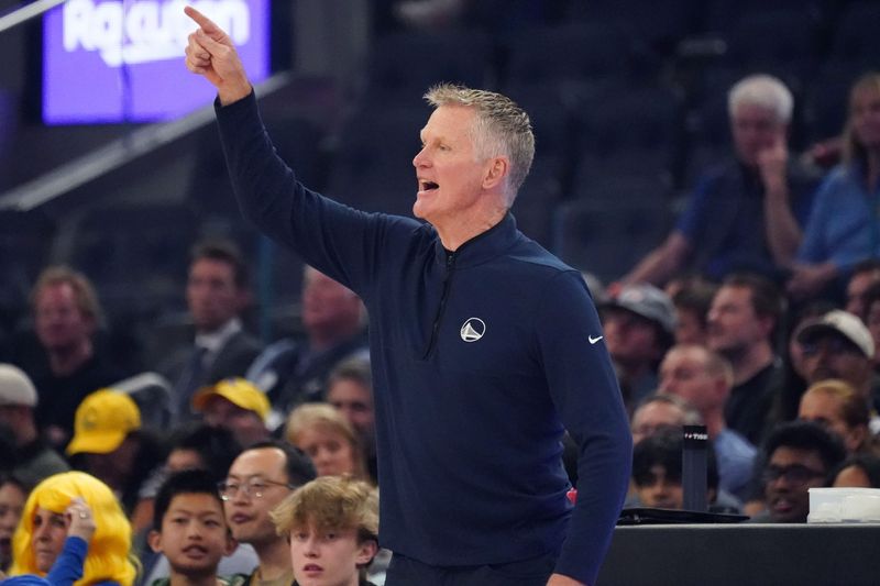 Apr 7, 2026; San Francisco, California, USA; Golden State Warriors head coach Steve Kerr signals to his players during a game against the Sacramento Kings in the first quarter at Chase Center. Mandatory Credit: David Gonzales-Imagn Images