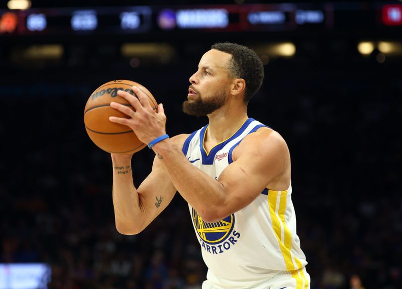 Apr 17, 2026; Phoenix, Arizona, USA; Golden State Warriors guard Stephen Curry (30) against the Phoenix Suns during the play-in rounds of the 2026 NBA Playoffs at Mortgage Matchup Center. Mandatory Credit: Mark J. Rebilas-Imagn Images
