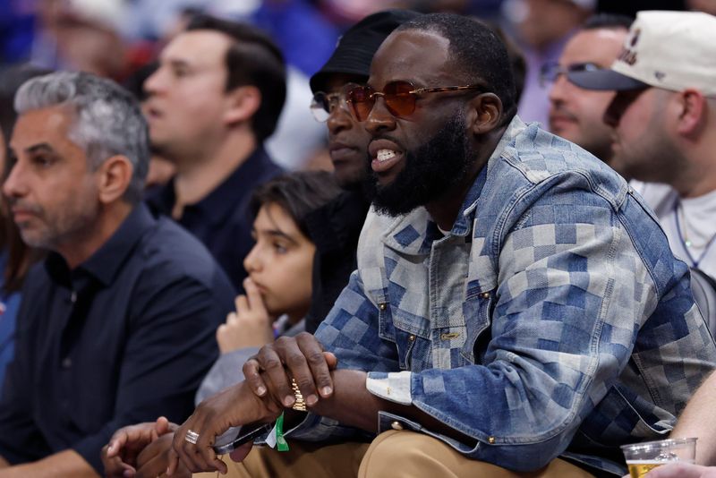 May 7, 2026; Detroit, Michigan, USA; Golden State Warriors forward Draymond Green looks on in the first half of the game between the Detroit Pistons and the Cleveland Cavaliers during game two of the second round of the 2026 NBA Playoffs at Little Caesars Arena. Mandatory Credit: Rick Osentoski-Imagn Images