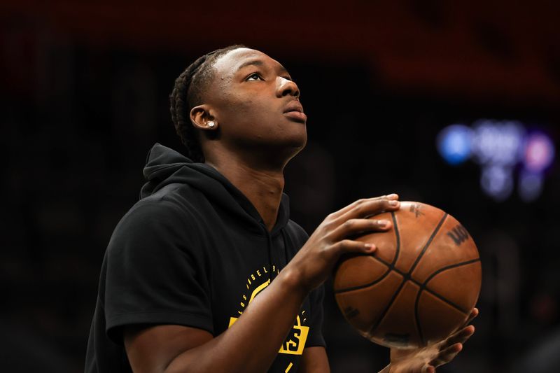 Mar 19, 2026; Miami, Florida, USA; Los Angeles Lakers forward Adou Thiero (1) warms up before tip off against the Miami Heat at Kaseya Center. Mandatory Credit: Isabella Frias-Imagn Images