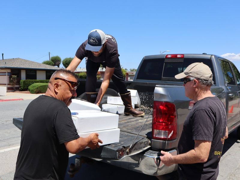 Monterey Bay Fisheries Trust delivers locally caught fish on May 6, 2026, to Nancy's Project, a food relief organization that partners with the food pantry at St. Paul's Episcopal Church for their Wednesday food distribution, in Salinas, Calif.