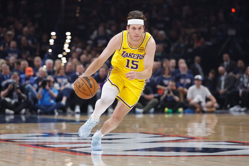 May 7, 2026; Oklahoma City, Oklahoma, USA; Los Angeles Lakers guard Austin Reaves (15) dribbles down the court against the Oklahoma City Thunder in the first half during game two of the second round of the 2026 NBA Playoffs at Paycom Center. Mandatory Credit: Alonzo Adams-Imagn Images