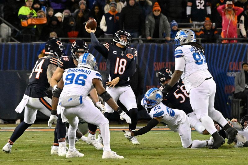 Jan 4, 2026; Chicago, Illinois, USA; Chicago Bears quarterback Caleb Williams (18) passes the ball against the Detroit Lions during the second half at Soldier Field. Mandatory Credit: Matt Marton-Imagn Images