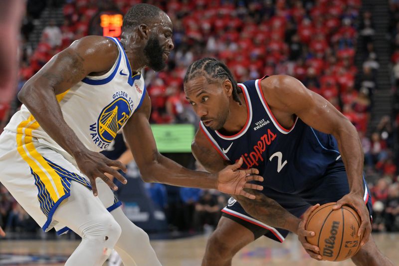 Apr 15, 2026; Inglewood, California, USA; Golden State Warriors forward Draymond Green (23) guards Los Angeles Clippers forward Kawhi Leonard (2) in the first half during the play-in rounds of the 2026 NBA Playoffs at Intuit Dome. Mandatory Credit: Jayne Kamin-Oncea-Imagn Images