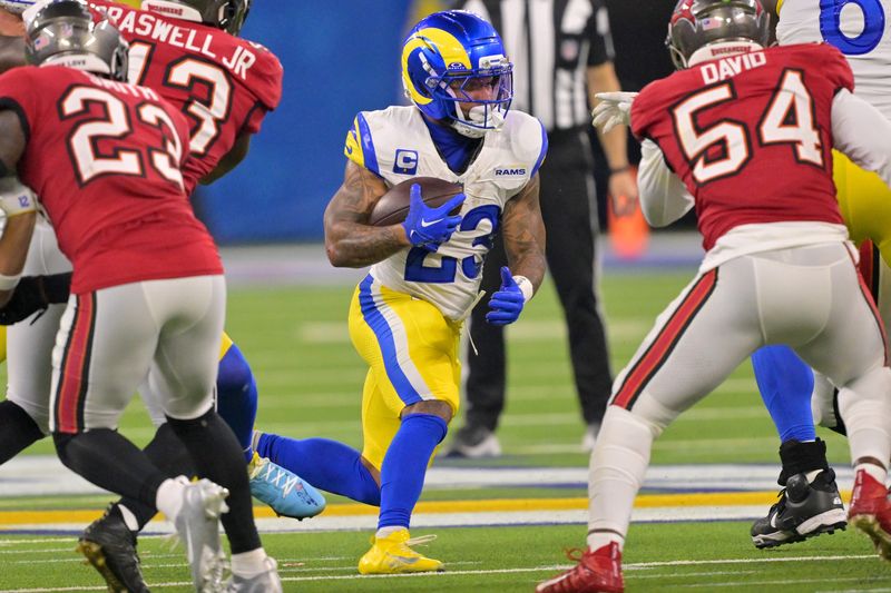 Nov 23, 2025; Inglewood, California, USA; Los Angeles Rams running back Kyren Williams (23) carries the ball against the Tampa Bay Buccaneers during the second half at SoFi Stadium. Mandatory Credit: Jayne Kamin-Oncea-Imagn Images