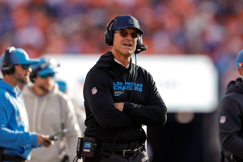 Jan 4, 2026; Denver, Colorado, USA; Los Angeles Chargers head coach Jim Harbaugh in the second quarter against the Denver Broncos at Empower Field at Mile High. Mandatory Credit: Isaiah J. Downing-Imagn Images