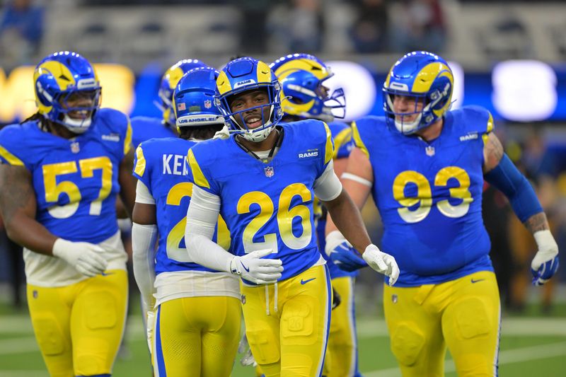 Jan 4, 2026; Inglewood, California, USA; Los Angeles Rams safety Kamren Kinchens (26) runs off the field following a defensive stop against the Arizona Cardinals during the second half at SoFi Stadium. Mandatory Credit: Jayne Kamin-Oncea-Imagn Images