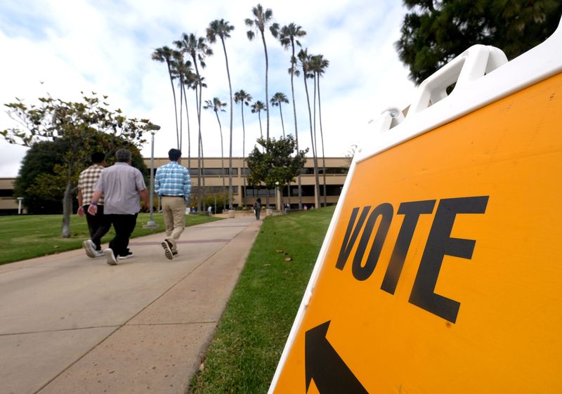 Voting signs point toward the Ventura County Elections Division in Ventura in May. The last day to vote or return a ballot is June 2.