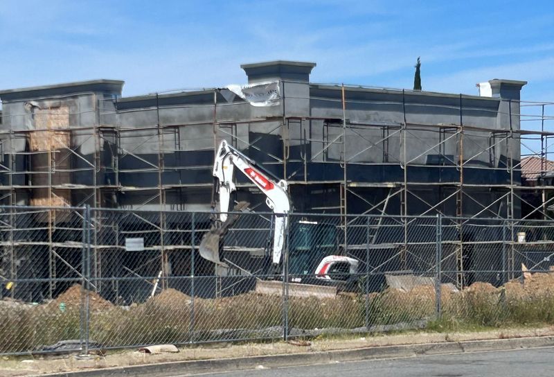 Construction continues on a Chevron Extra Mile gas station-minimart in north Redding at the former Record Searchlight on Friday, May 15, 2026.