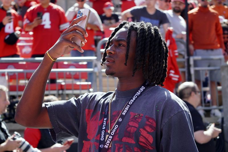 Danny Lang, Mater Dei defensive back, soaks up the atmosphere of the game between the Ohio State Buckeyes and Texas Longhorns at Ohio Stadium on Aug. 30, 2025.