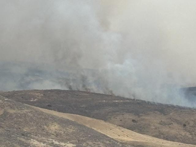 A fire burns in remote, rugged terrain on Santa Rosa Island on May 15.