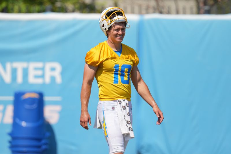Jun 13, 2024; Costa Mesa, CA, USA; Los Angeles Chargers quarterback Justin Herbert (10) reacts during minicamp at the Hoag Performance Center. Mandatory Credit: Kirby Lee-USA TODAY Sports