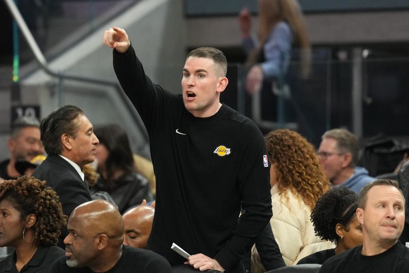 Jan 25, 2025; San Francisco, California, USA; Los Angeles Lakers assistant coach Greg St. Jean (center) yells during the third quarter against the Golden State Warriors at Chase Center. Mandatory Credit: Darren Yamashita-Imagn Images