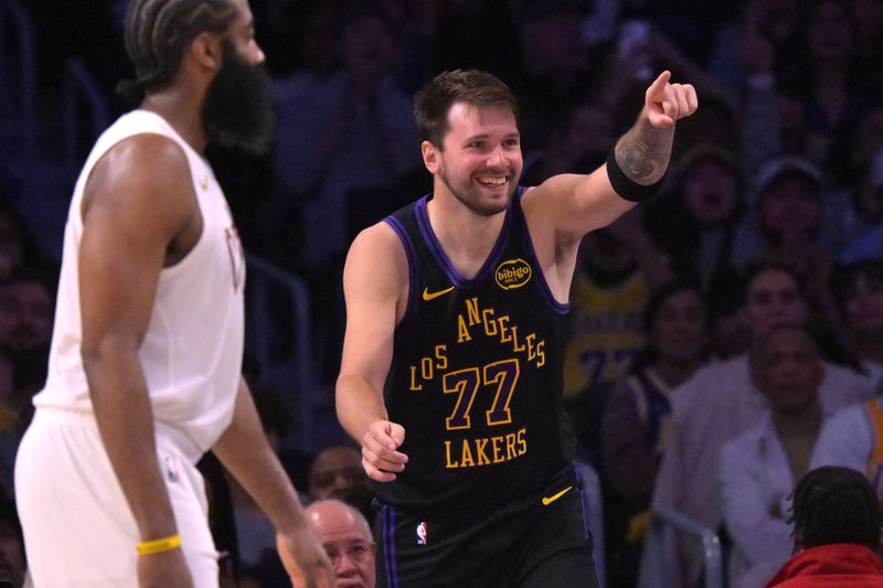 Mar 31, 2026; Los Angeles, California, USA; Los Angeles Lakers guard Luka Doncic (77) reacts after a basket in the second half against the Cleveland Cavaliers at Crypto.com Arena. Mandatory Credit: Jayne Kamin-Oncea-Imagn Images