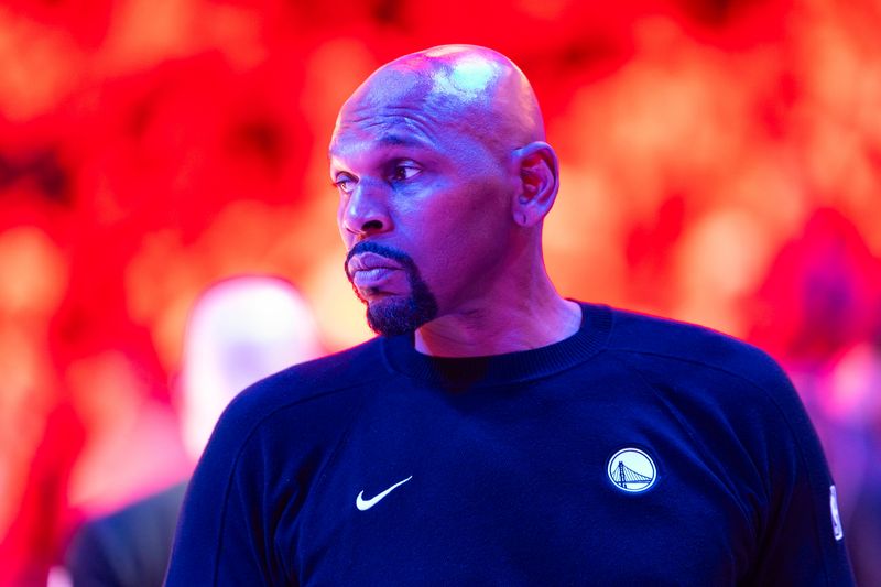 Feb 5, 2026; Phoenix, Arizona, USA; Golden State Warriors assistant coach Jerry Stackhouse against the Phoenix Suns at Mortgage Matchup Center. Mandatory Credit: Mark J. Rebilas-Imagn Images