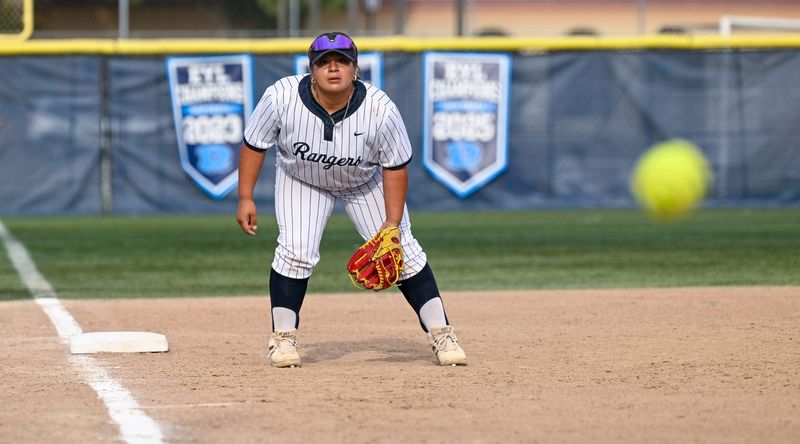 Redwood's Jaden Lopez watches a pitch cross the plate against Selmain a 2026 CIF Central Section Softball Championship quarterfinal on Wednesday, May 20, 2026.
