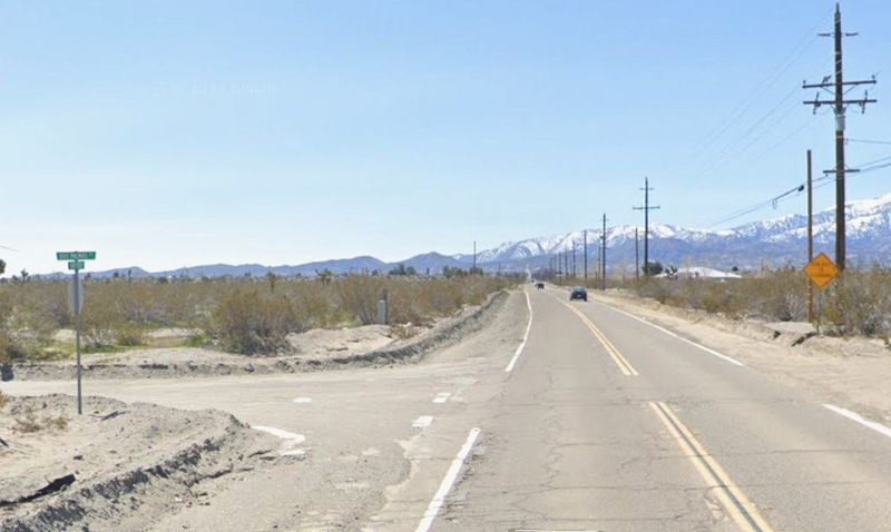 The intersection of Sheep Creek Road and Dos Palmas Road in Phelan.