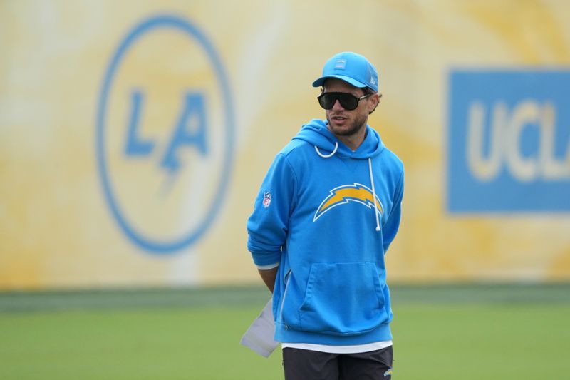 May 11, 2026; El Segundo, CA, USA; Los Angeles Chargers offensive coordinator Mike McDaniel watches during offseason workouts at The Bolt. Mandatory Credit: Kirby Lee-Imagn Images