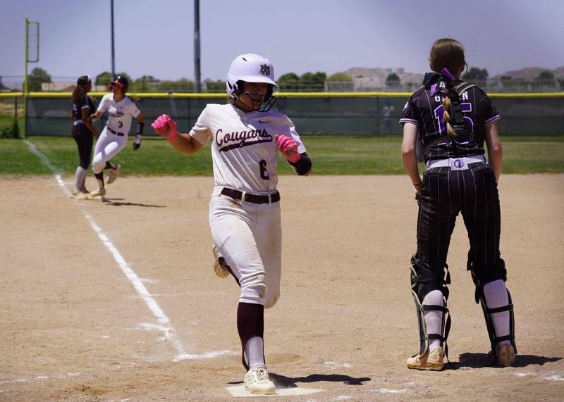 Granite Hills' Mackinzie Gomez scores a run, trailed by Kathryn McCartney during the CIF-Southern Section second round against Eastside on May 16, 2026.