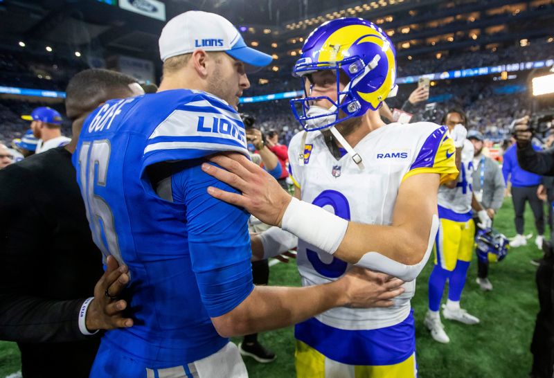 Jan 14, 2024; Detroit, Michigan, USA; Detroit Lions quarterback Jared Goff (16) and Los Angeles Rams quarterback Matthew Stafford (9) greet each other after a 2024 NFC wild card game at Ford Field. Mandatory Credit: David Reginek-USA TODAY Sports