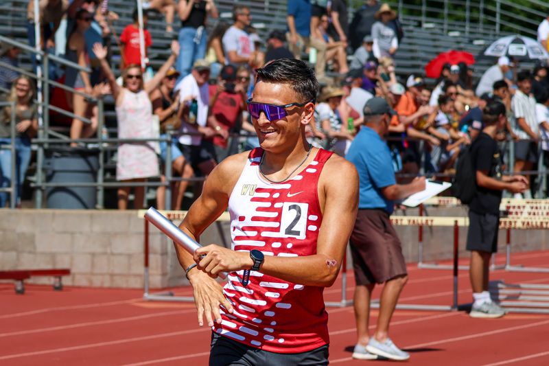 West Valley senior Isaiah Larceval smiles after finishing the last leg of the 4x800m relay race. Larceval and the Eagles set an NSCIF record with their first-place time of 7:53.24 in the 4x800m relay. May 22, 2026.