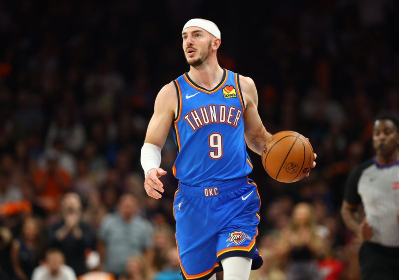 Apr 27, 2026; Phoenix, Arizona, USA; Oklahoma City Thunder guard Alex Caruso (9) against the Phoenix Suns during game four of the first round of the 2026 NBA Playoffs at Mortgage Matchup Center. Mandatory Credit: Mark J. Rebilas-Imagn Images
