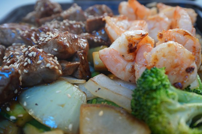 The combo plate with steak and shrimp at Takumi Teppanyaki food truck in Oxnard on May 22, 2026. The dish comes with rice and vegetables.
