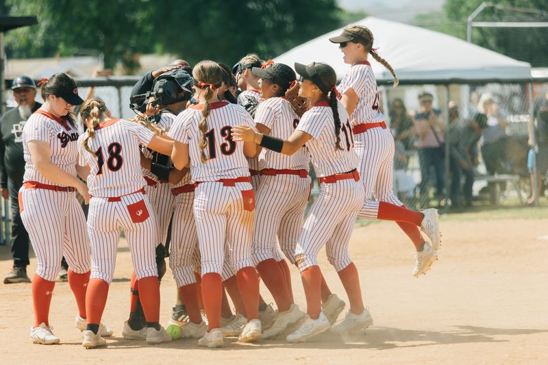 The Grace School softball team celebrates after beating Jurupa Hills-Patriot 16-10 in a CIF-Southern Section Division 5 semifinal on Saturday, May 23, 2026, in Simi Valley.