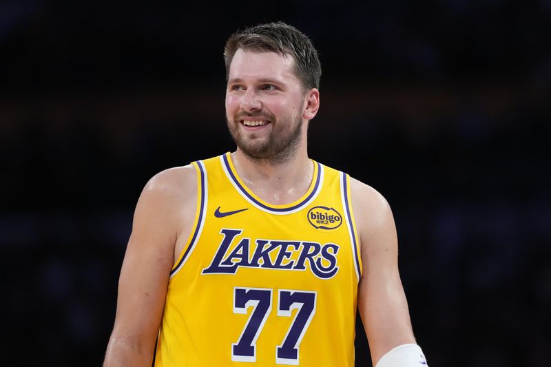 Mar 6, 2026; Los Angeles, California, USA; Los Angeles Lakers guard Luka Doncic (77) reacts against the Indiana Pacers in the first half at Crypto.com Arena. Mandatory Credit: Kirby Lee-Imagn Images