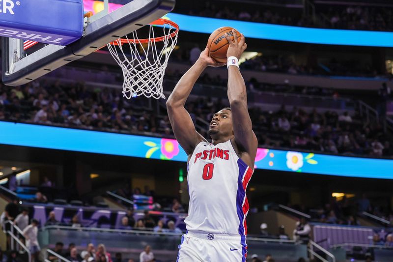 Apr 6, 2026; Orlando, Florida, USA; Detroit Pistons center Jalen Duren (0) dunks during the second quarter against the Orlando Magic at Kia Center. Mandatory Credit: Mike Watters-Imagn Images